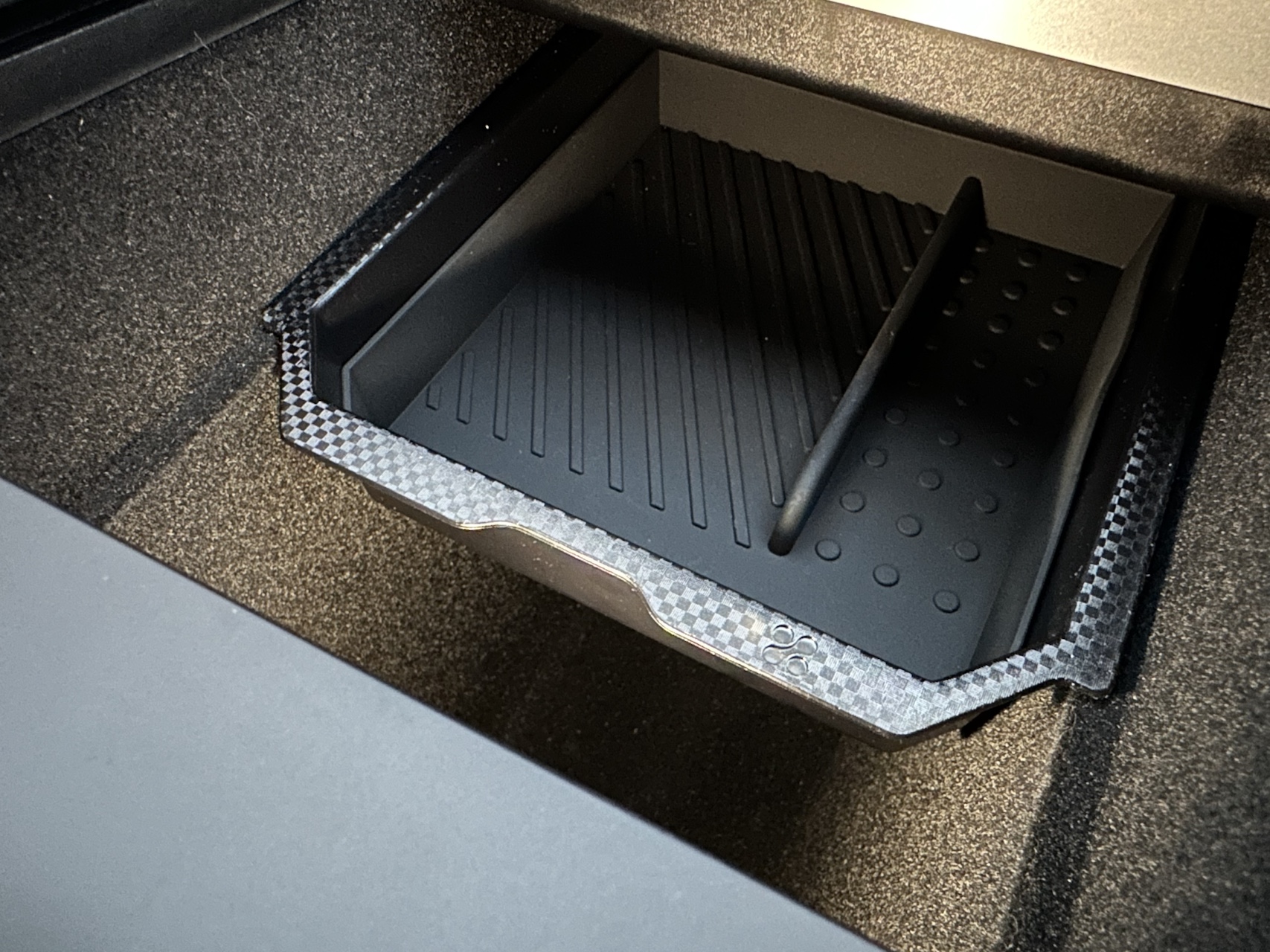 Installed Model Y center console organizer tray close-up